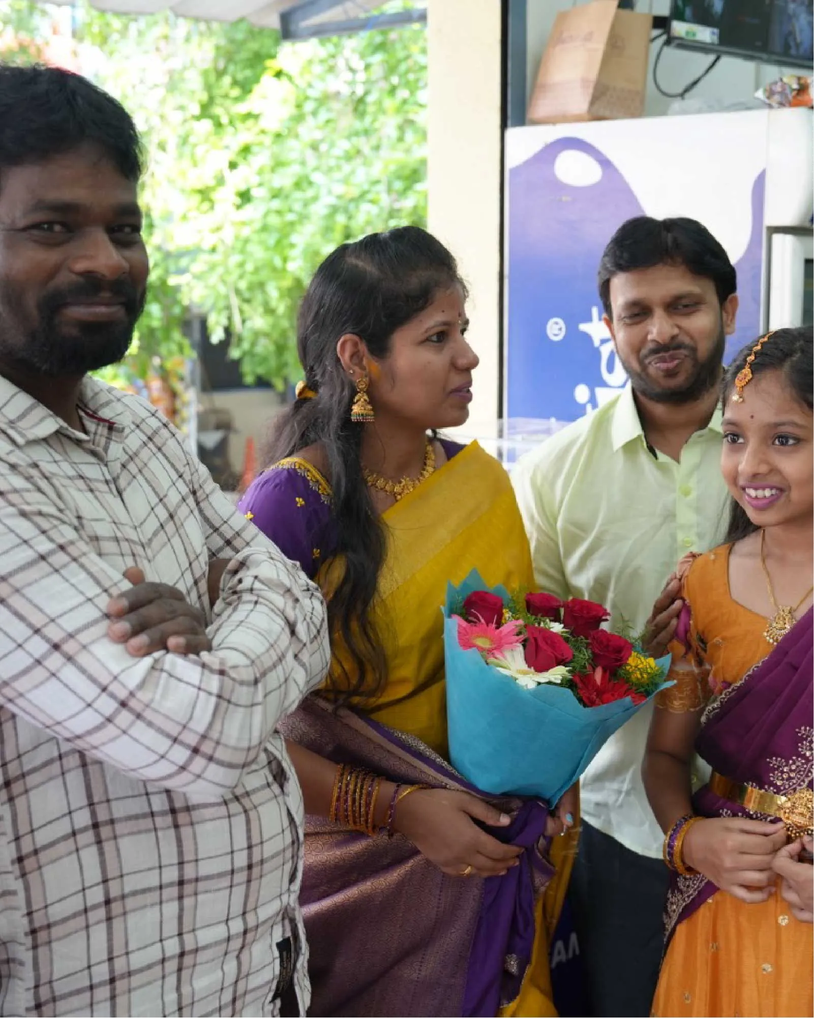 A family at their store opening